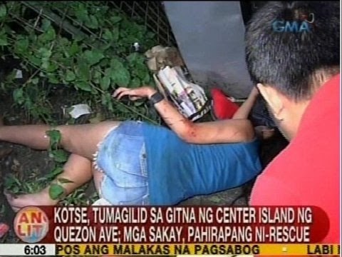 UB: Kotse, tumagilid sa gitna ng center island ng Quezon Ave.; mga sakay, pahirapang ni-rescue