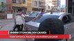 Eşiyle tartışan kadın, öfkesini kocasının otomobilinden çıkardı