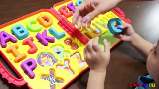 The ABC Puzzle Elmos on the go letters   Learning Colors