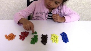 NUMBERS COLORS AND COUNTING FOR CHILDREN USING M&M'S