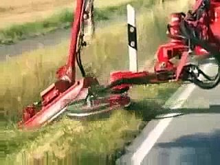 Cutting A Unwated Grass And Tree Machine
