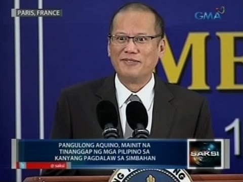 Pres. Aquino, mainit na tinanggap ng mga Pilipino sa kanyang pagdalaw sa simbahan sa Paris
