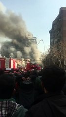 عشرات المصابين تحت أنقاض برج منهار بطهران