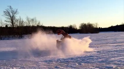 Download Video: T-Rex Doing Frozen Ice Donuts on ATV! Show Us Your ATV Videos & Win!