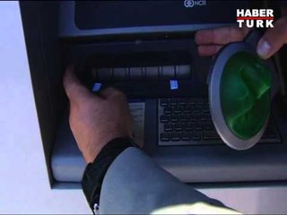 Dolandırıcılar ATM'ye kamera kurdu