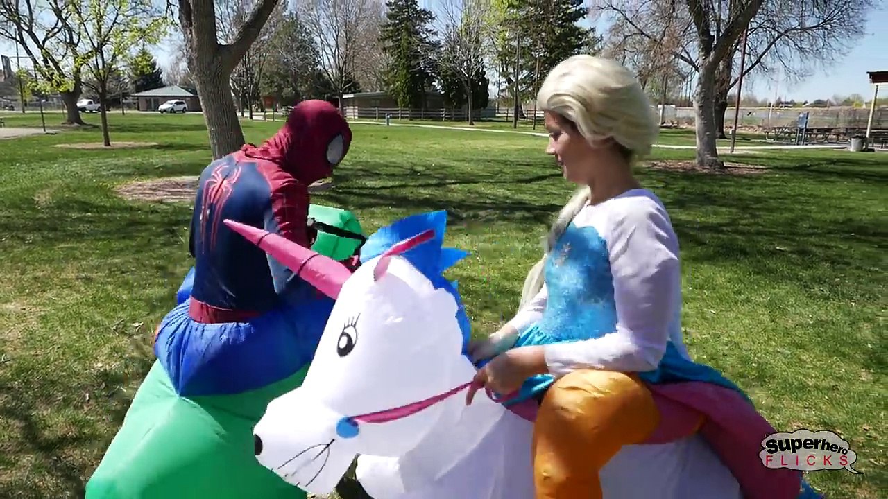 Elsa and Spiderman vs Bane - Elsa turns to Unicorn, Spiderman turns to T-Rex | In Real Life!