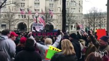 Trump supporters and protesters face off outside his hotel