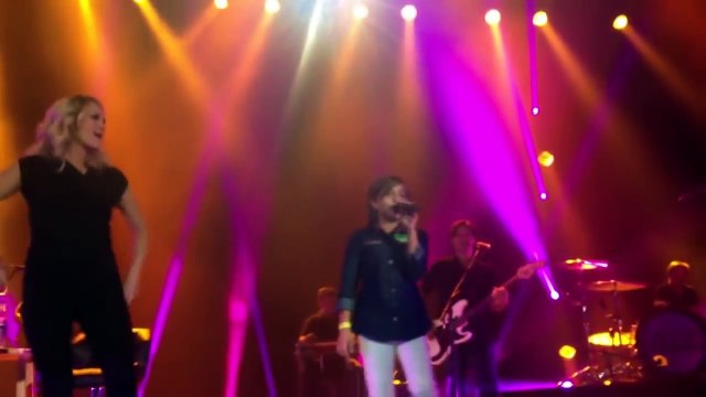 Fans Singing on Stage with Famous Singers