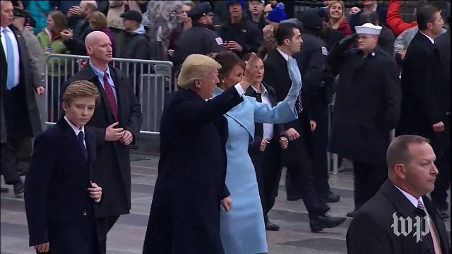 Trump family waves to crowd during inaugural parade