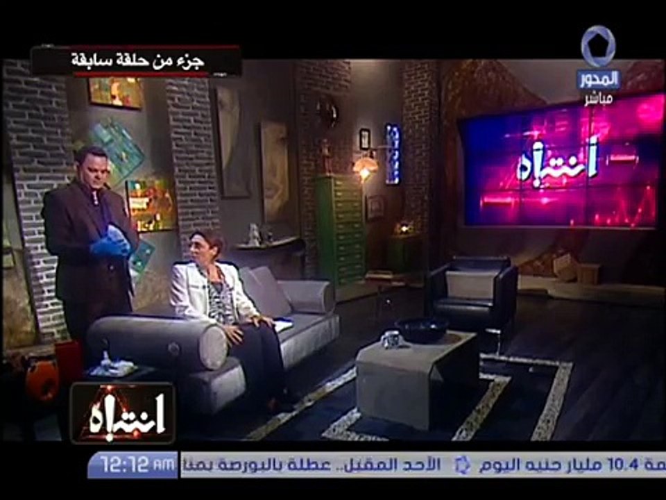منى العراقى تحقن نفسها على الهواء !