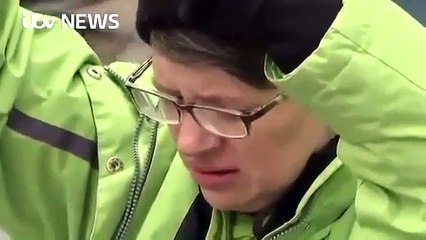 Anti-Trump protester screams in agony as the new US President is sworn in