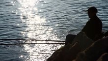 A_fisherman_on_the_seashore