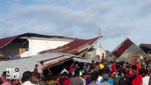 Buildings collapse, hospitals fill up after Indonesian quake-lDzLSUIhED0
