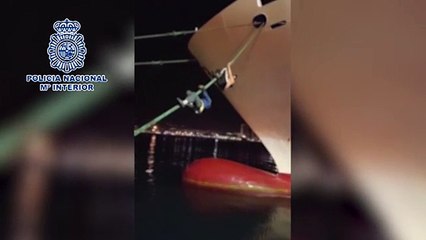 Migrants slide down from ferry in hopes to reach Europe