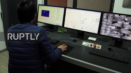 China - First ever robotic parking garage opens in Nanjing