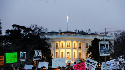 "Not our president!" shout angry protesters in the US