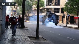 Rio police clashes with protesters, at a time when authorities vote on new austerity measures-IFZevamxtEQ