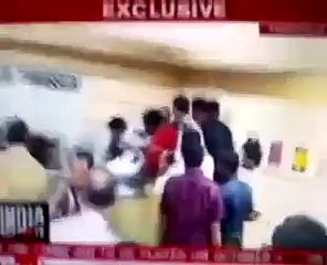 Indian Politician man falls during a press conference