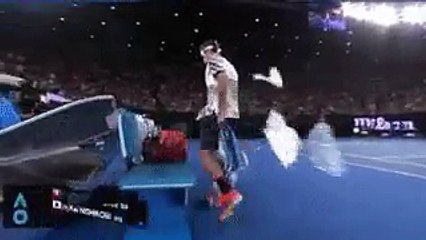 Federer angry throws stuff on the bench