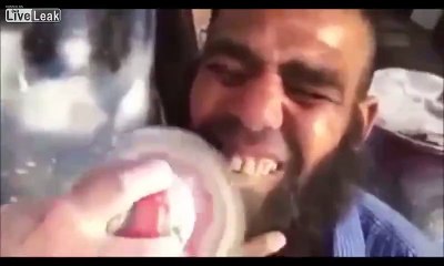 LiveLeak - Man gets his yellow teeth whitened with a car polisher