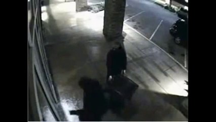 Thieves Attempt to Break Through Window with Window Film on Security Camera