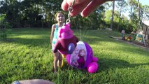 HUGE FROZEN ELSA & ANNA INFLATABLE BEACH BALL SPRINKLER WATER TOYS & Big Surprise Eggs Frozen Videos