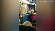 Mom sobs after AA flight attendant violently took her stroller