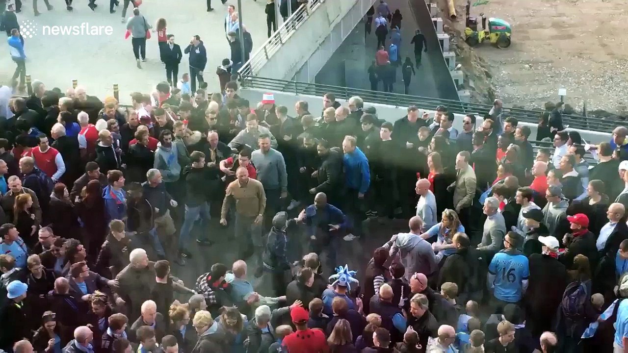 Arsenal and Man City fans clash outside Wembley