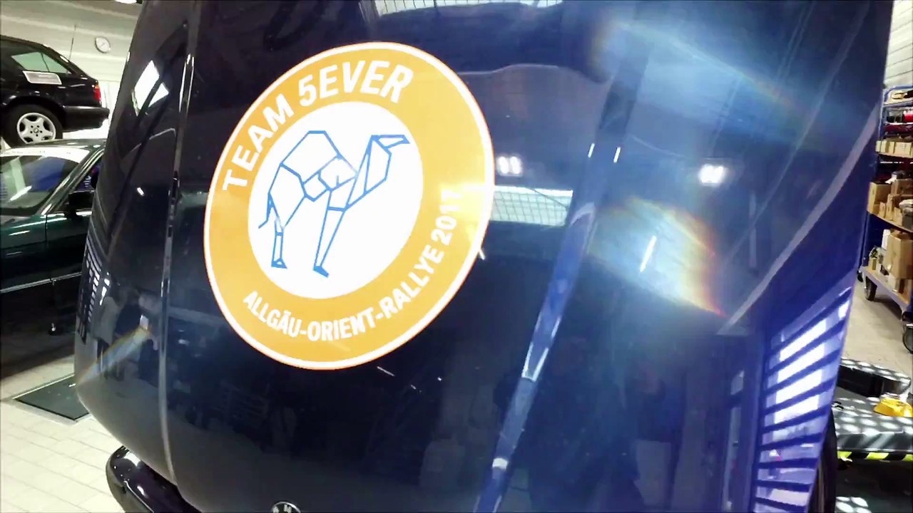 Feature including auto workshop and BMW 520i Touring E34 with team 5EVER