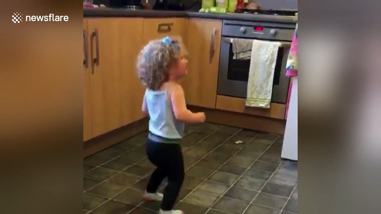 Toddler's funky dance to Bruno Mars sends her falling out of room