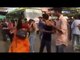 Woman slaps girl during flash mob for stopping traffic, Watch video