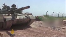 Syrian forces advance on town near Hama