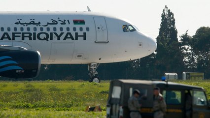 Passenger plane reportedly hijacked over Libya lands in Malta