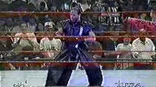WWE - HBK Poses As The Undertaker