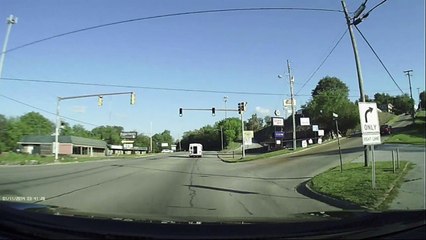 Girl, 4, falls out back of bus onto busy road