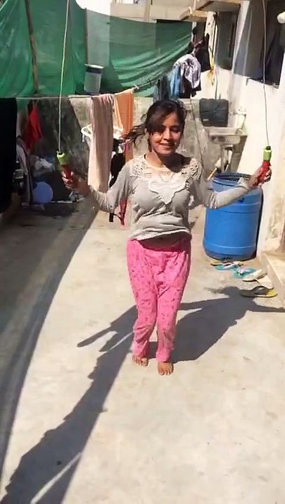 girl sweeping in slow motion