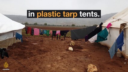 Aleppo evacuees living in squalid camps