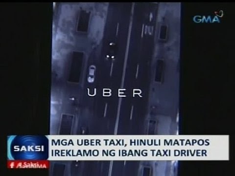 Saksi: Mga 'Uber' taxi, hinuli matapos ireklamo ng ibang taxi driver