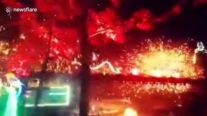 Toaist Chinese New Year tradition involves lighting fireworks with liquid hot iron