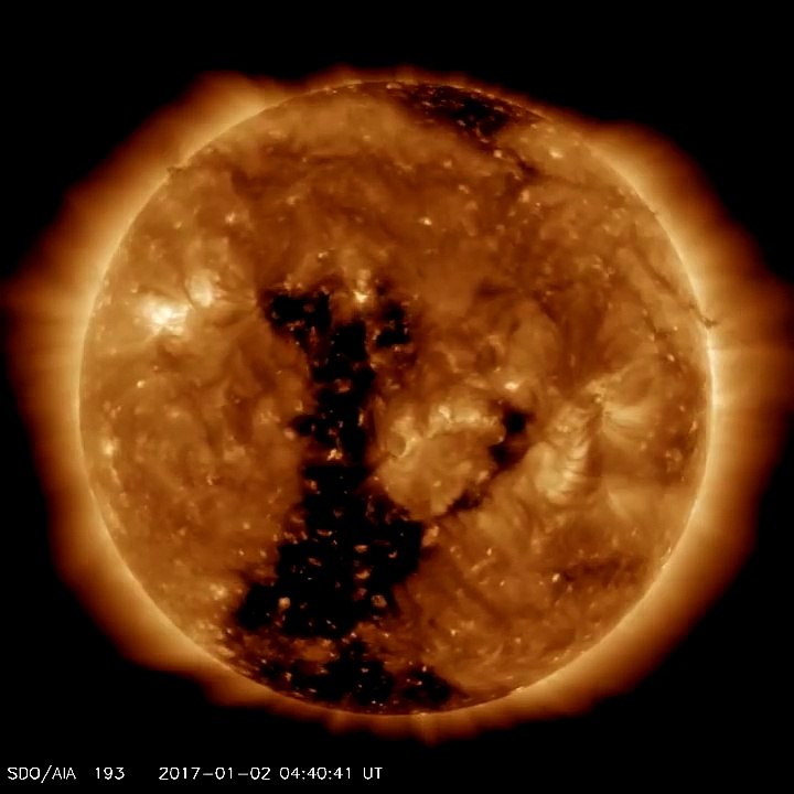 MAGNETIC FIELD HOLE IN THE SUN