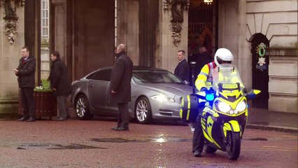 Theresa May is booed for response to Trump's immigration ban