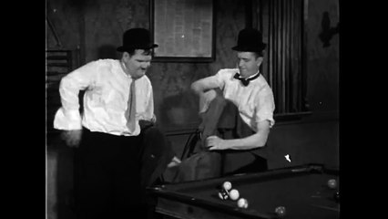 Laurel and Hardy in a scene from Any Old Port (1932)
