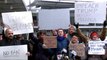Protesters rally against Trump's travel ban affecting Muslims