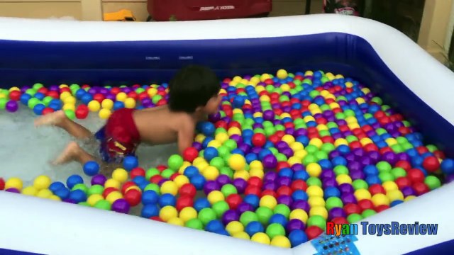 GIANT BALLOONS SURPRISE TOYS and Ball Pit challenge in huge pool Disney toys Ryan ToysReview