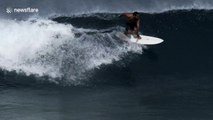 Singer Jack Johnson surfs perfect waves