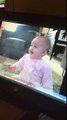 Baby Laughing while watching Another Baby laughing TV