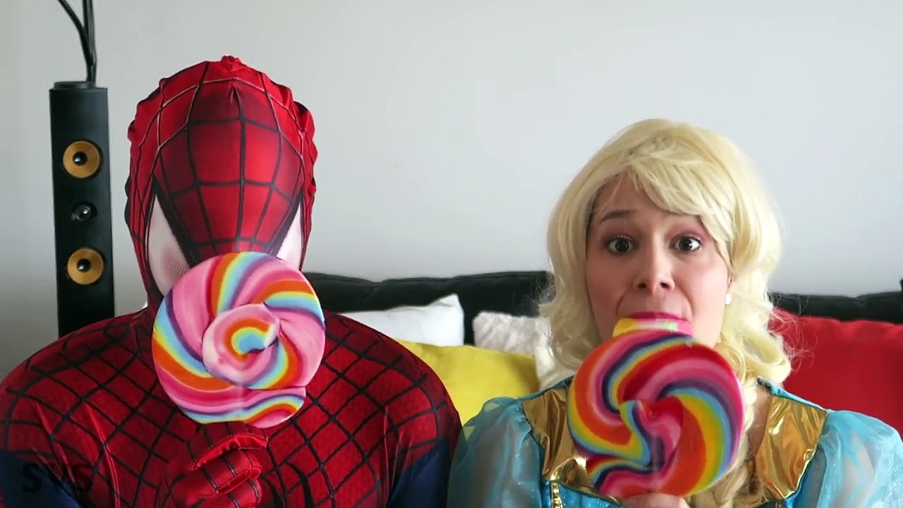 SPIDERMAN vs FROZEN ELSA - Gummy JOKER TONGUE & Giant Lollipop! Superhero Fun in Real Life