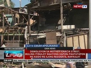 Demolisyon sa Mother Ignacia Street, pansamantalang itinigil matapos magkagulo