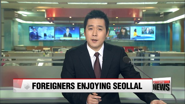 Foreigners participate in events to try out Korean traditional customs