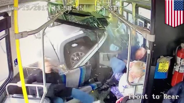 Pickup smashes into bus: video shows insane moment truck crashes through public bus